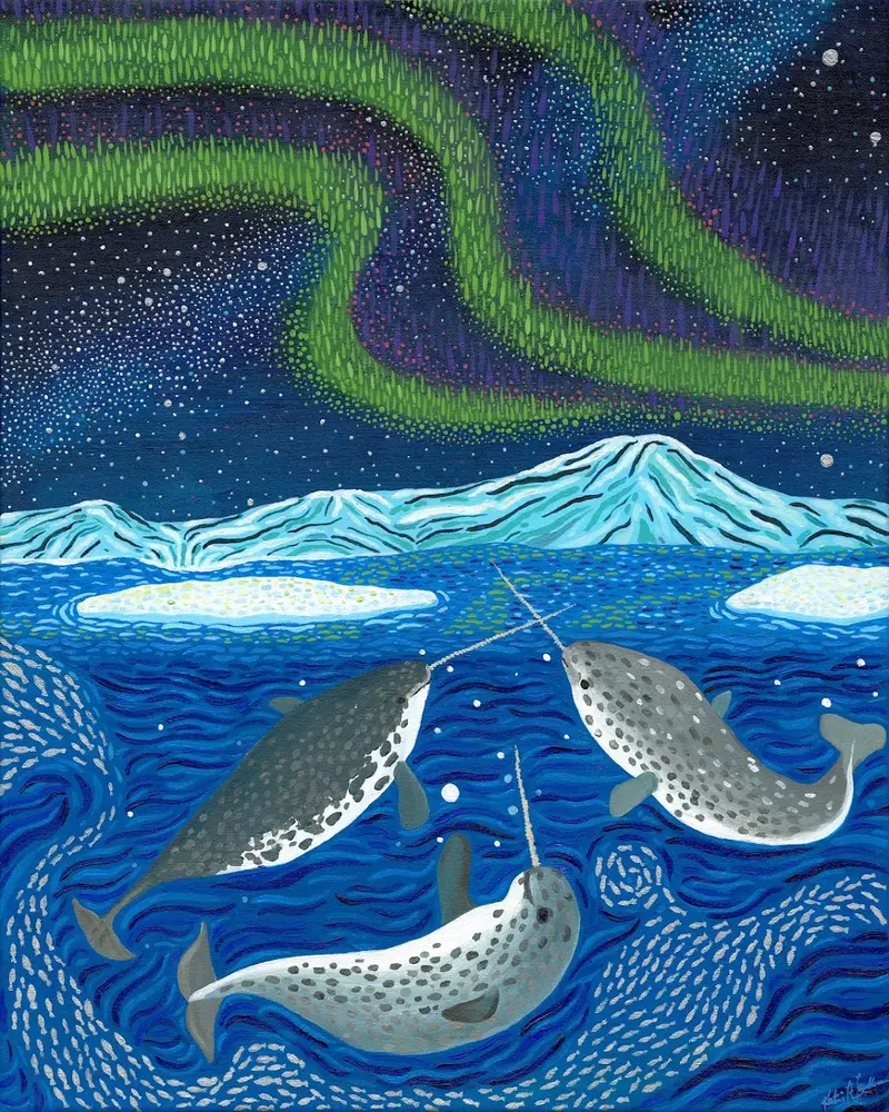 Three spotted narwhals swim through deep blue water beneath a split waterline. Above the surface, snow-covered peaks and floating ice sit under a green and violet aurora in a starry sky. Below it, swirling ribbons of tiny silver fish curl around the narwhals and their long spiral tusks.