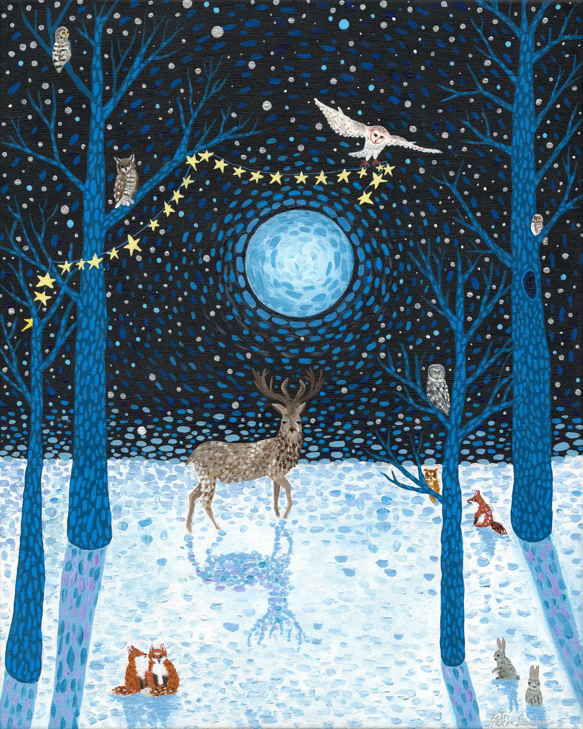 A stag with wide antlers stands in deep blue moonlit snow at the centre of a winter forest. Behind it a large pale blue moon is ringed by concentric dashes of blue and silver. Bare cobalt birch trunks frame the scene, a string of yellow paper stars is hung between two of them, and a quorum of owls watches from the branches while foxes and rabbits sit in the snow below.